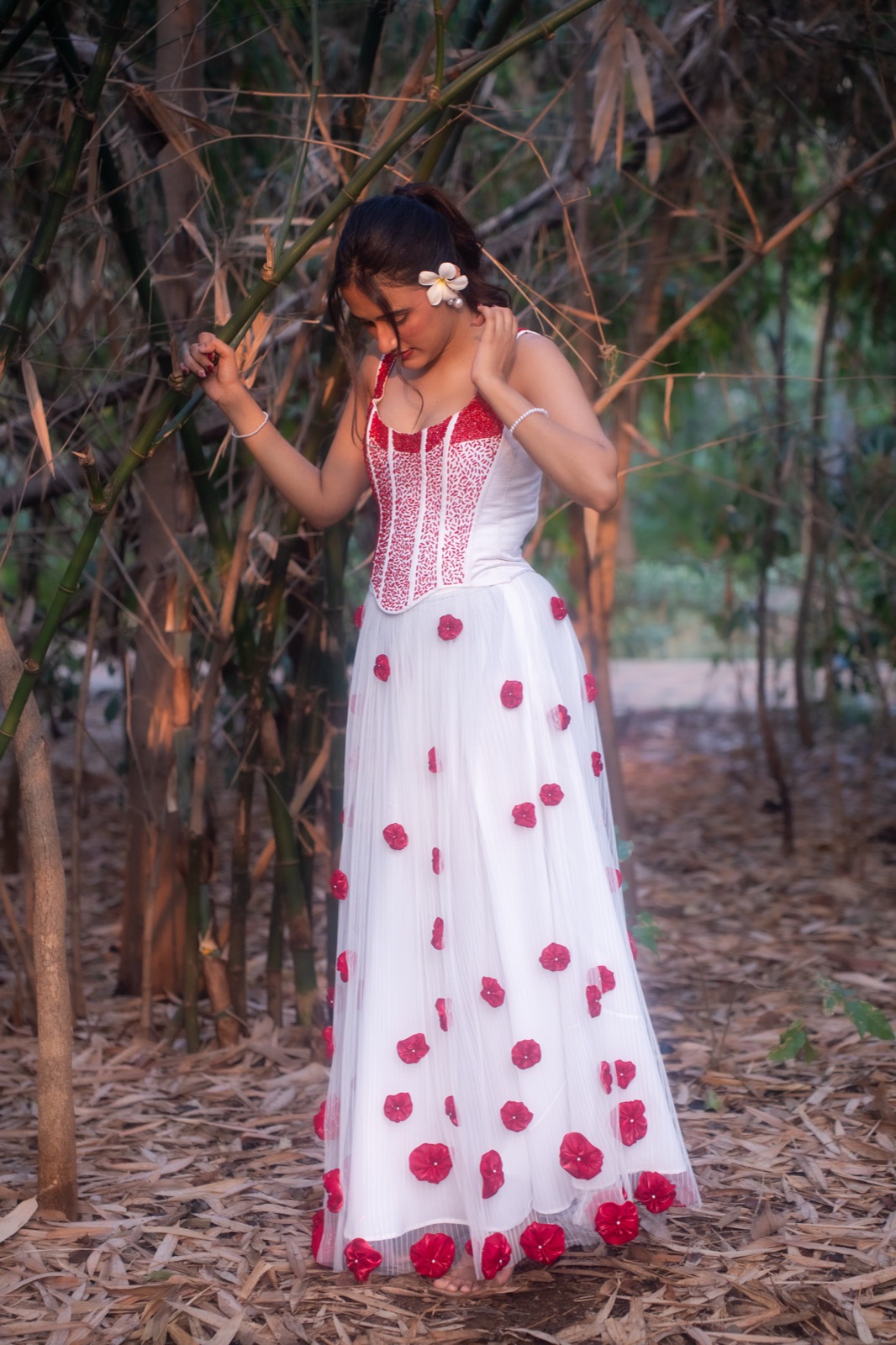 Carmine Rosette — full length among the bamboo