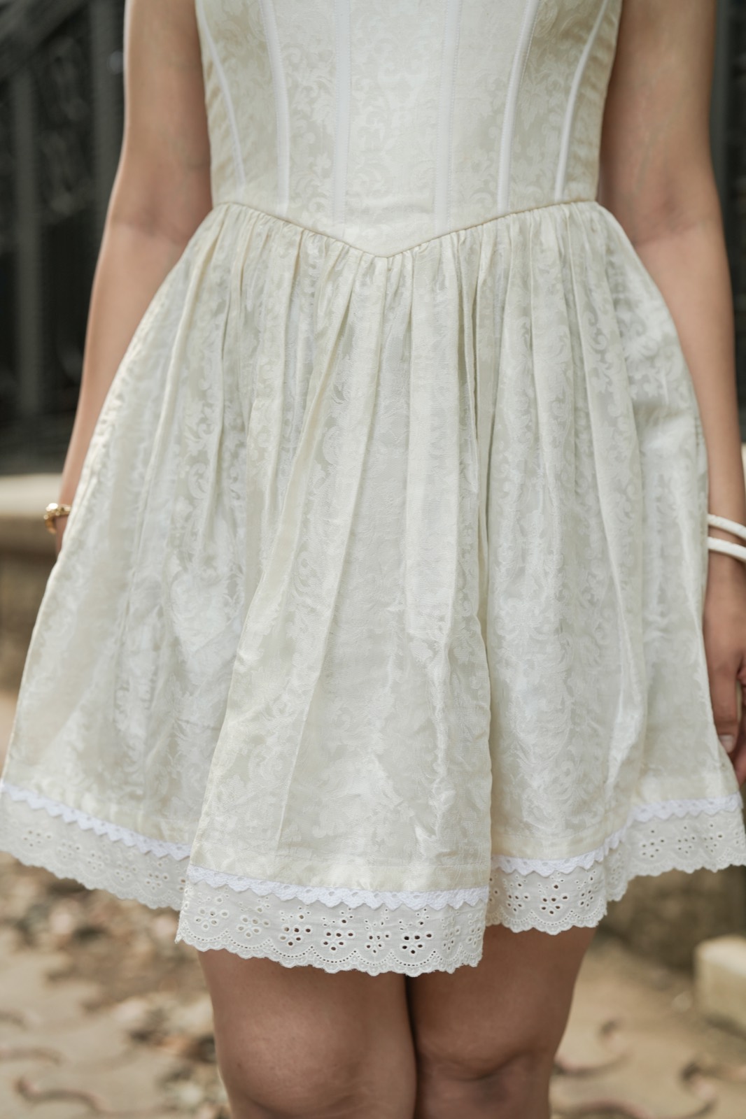 Sunset Brocade — the gathered skirt and its scalloped eyelet hem