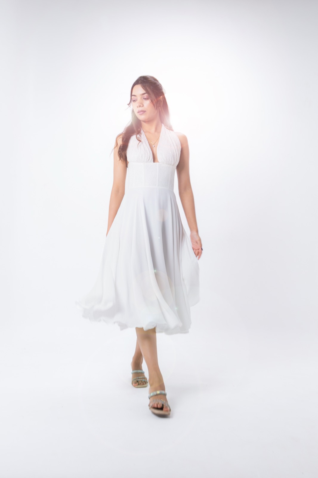 White Halter Midi — full length, a white halter-neck dress with a full skirt falling to mid-calf