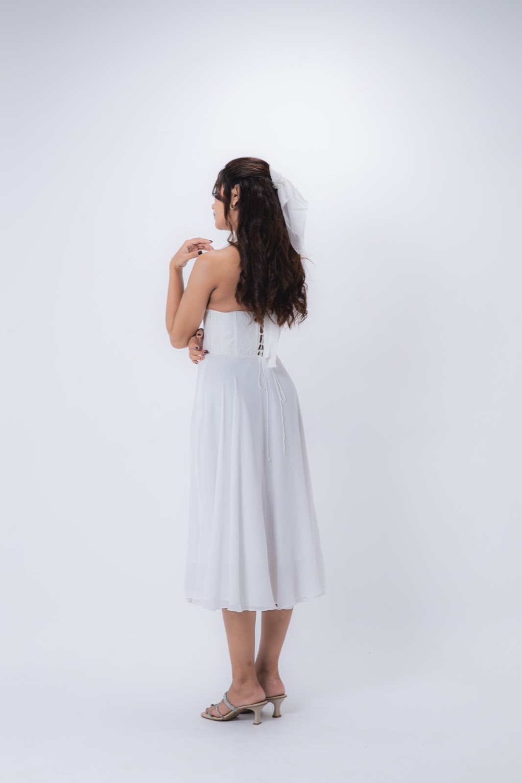White Halter Midi — from behind, showing the bodice laced at the back