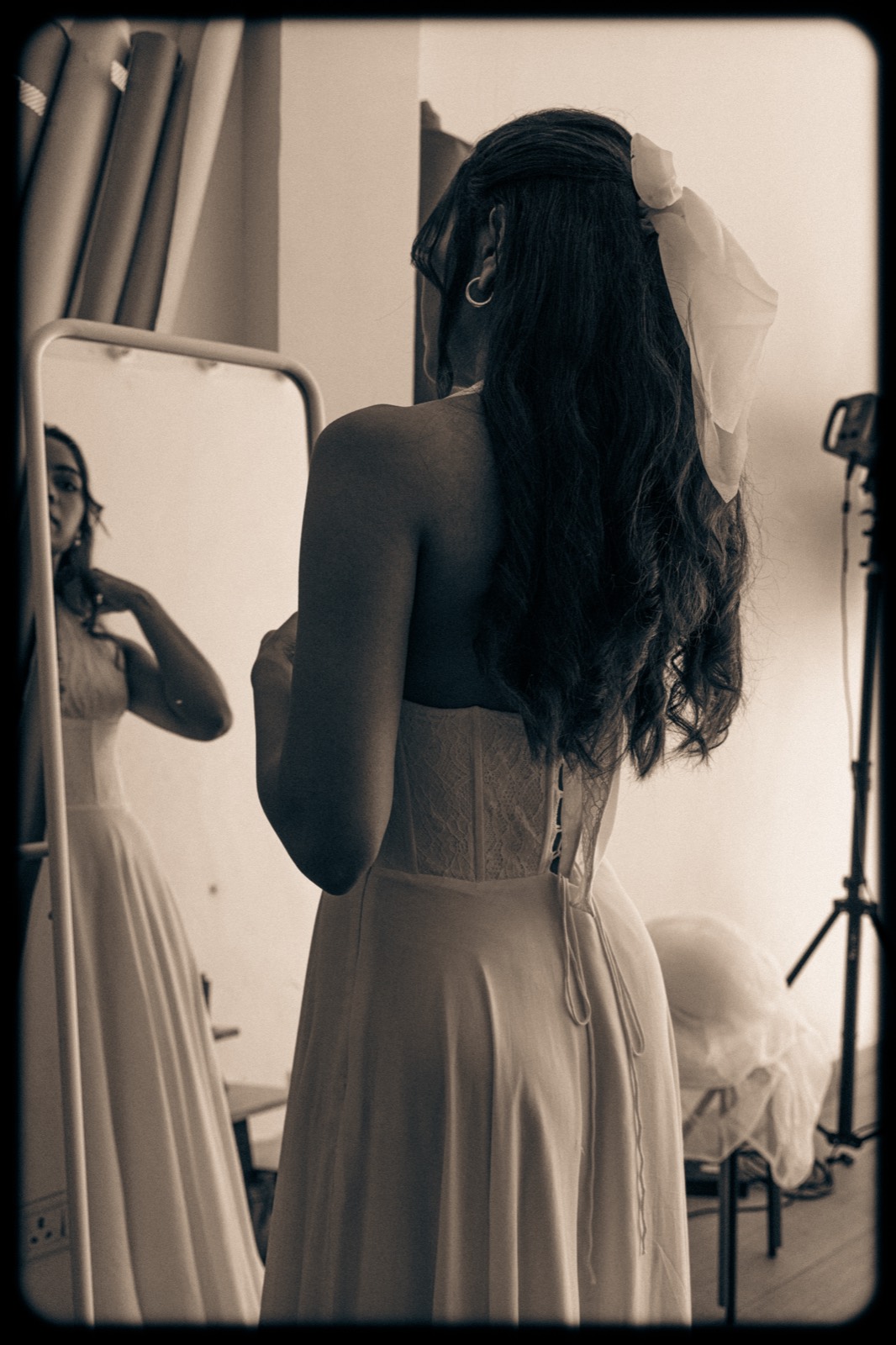 White Halter Midi — the laced back reflected in a studio mirror, in sepia