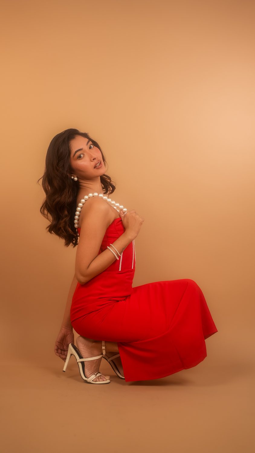 The Scarlet Gown — Where bold color meets sculpted elegance.